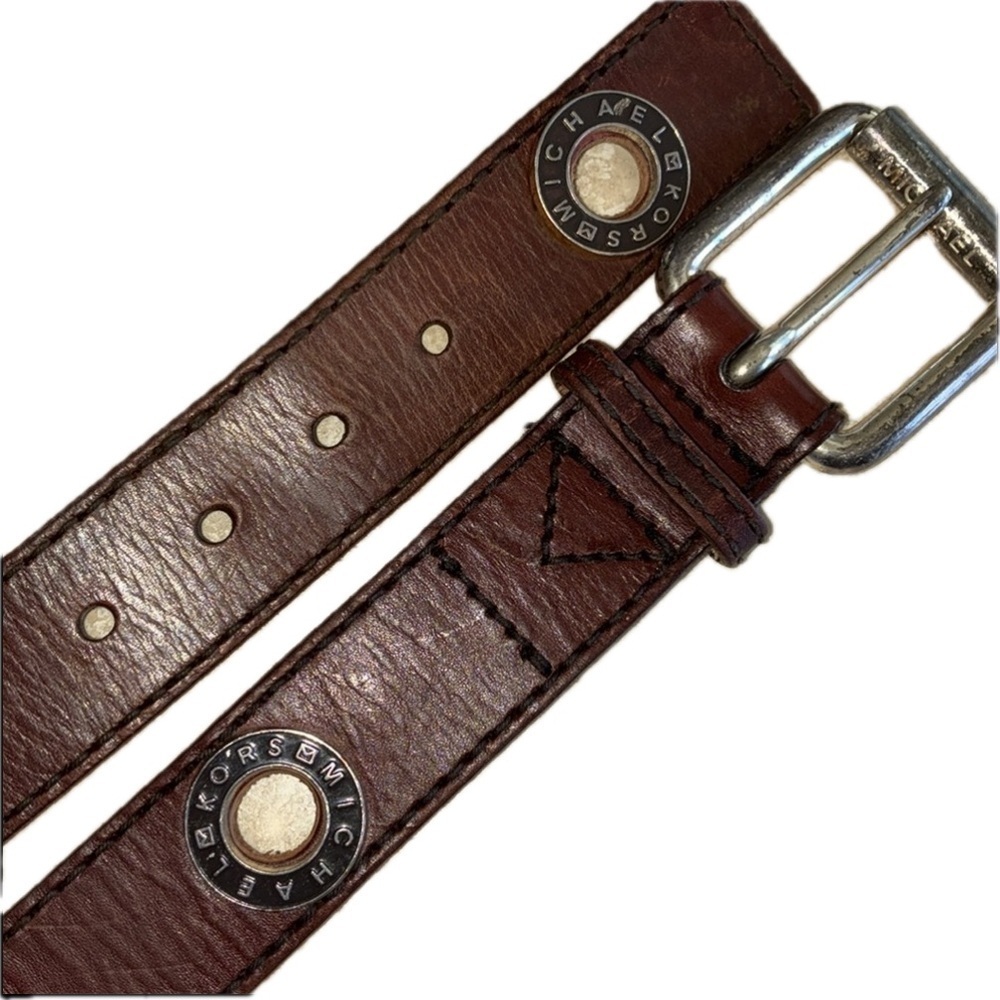 Michael Kors Belt, women S Brown leather, monogram metal grommets & buckle. GUC